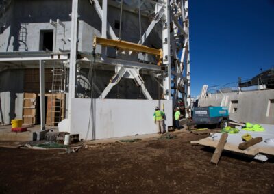 The first precast panel installation on lower enclosure.