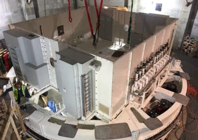 Manifolds and electric panels installed on the Coudé Rotator, part of the support structure for the Telescope. Photo by George Ruper, June 29, 2016.