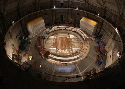 View looking down inside the Coudé pier area, where the Coudé rotator base segments and bearing rails are being installed. Photo by Brett Simison, 06-Jan-2016.