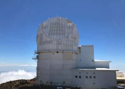 The DKIST Telescope Enclosure and Support and Operations buildling at the site on Haleakala, HI.