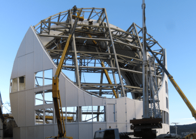 Factory assembly of the enclosure cladding panel modules is ongoing near Bilbao, Spain. January 2014.