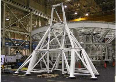 Optic Support Structure upper portion on ground in front of coudé rotator, at the Ingersoll factory. 07 April 2014.