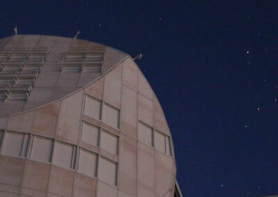 The night sky glows behind the NSF's Daniel K. Inouye Solar Telescope.