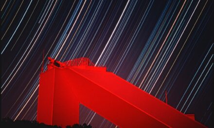 A nine-hour exposure of the McMath-Pierce Solar Facility on Kitt Peak. The normally white building appears red due to high altitude haze following the 1991 eruptions of Mount Pinatubo. No filters or multiple exposures were used