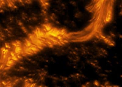 A detailed example of a light bridge crossing a sunspot’s umbra. In this picture, the presence of convection cells surrounding the sunspot is also evident. Hot solar material (plasma) rises in the bright centers of these surrounding “cells,” cools off, and then sinks below the surface in dark lanes in a process known as convection. The detailed image shows complex light bridge and convection cell structures on the Sun's surface or photosphere. Light bridge: A bright solar feature that spans across an umbra from one penumbra to the other. It is a complex structure, taking different forms and phases, and is believed to be the signature of the start of a decaying sunspot. Umbra: Dark, central region of a sunspot where the magnetic field is strongest. Image Title: Properties of Convection Cells and Light Bridge Seen Around a Sunspot PID: PID_1_29 Image Credit: NSF/AURA/NSO Image Processing: Friedrich Wöger(NSO), Catherine Fischer (NSO) Science Credit: Philip Lindner at Leibniz-Institut für Sonnenphysik (KIS)