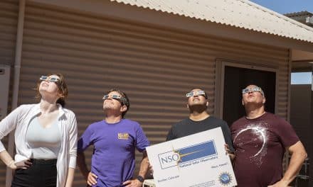 NSO team at the eclipse site, gazing up to the Sun using safety-certified eclipse glasses. Left to right: Sarah Bruce (CU Boulder), Kevin Reardon (NSO), Sanjay Gosain (NSO), and John Williams (NSO). Credit: John Williams/NSO/AURA/NSF