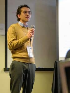 Hale Fellow and CU PhD student James Crowley talks about his research to AURA Board in October 2023.